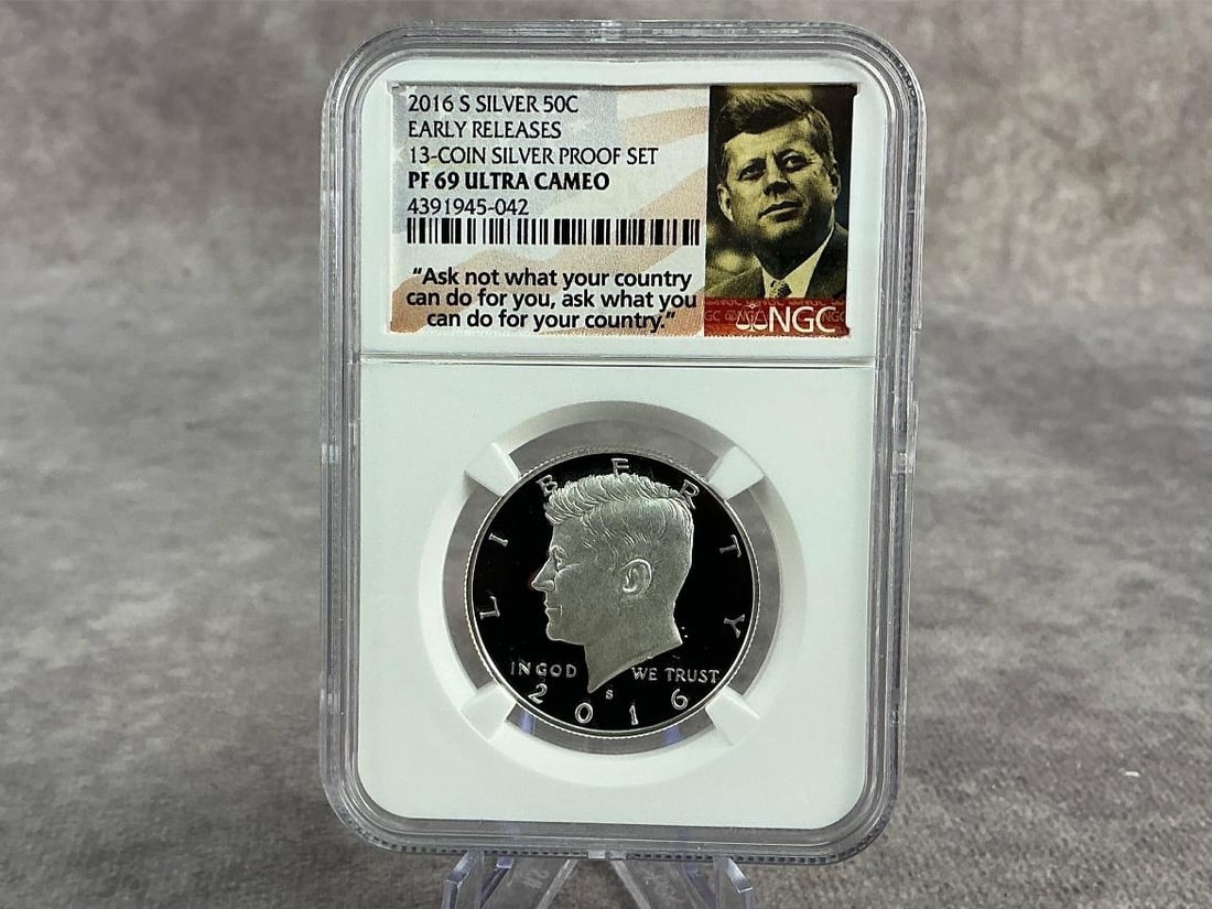 Kennedy Half: 2016 S Silver Kennedy half dollar, PF 69 Ultra Cameo, graded by NGC. Certification number 4391945-042. Measures 2.25 inches wide x 3.25 inches tall.