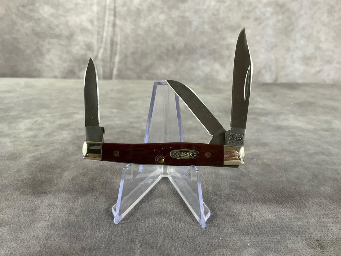 Red & Brown Bone Knife: Case XX Small Stockman. 6333 ss. Tight snap, measures 2 3/4 inches long X 1/2 inch tall.