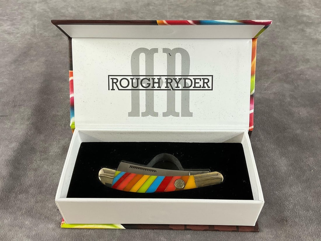 Lollipop Knife: Rough Ryder Razor Lockback. RR2471 Tight snap. Box measures 6.25 inches long X 3 inches wide X 1.75 inches high.