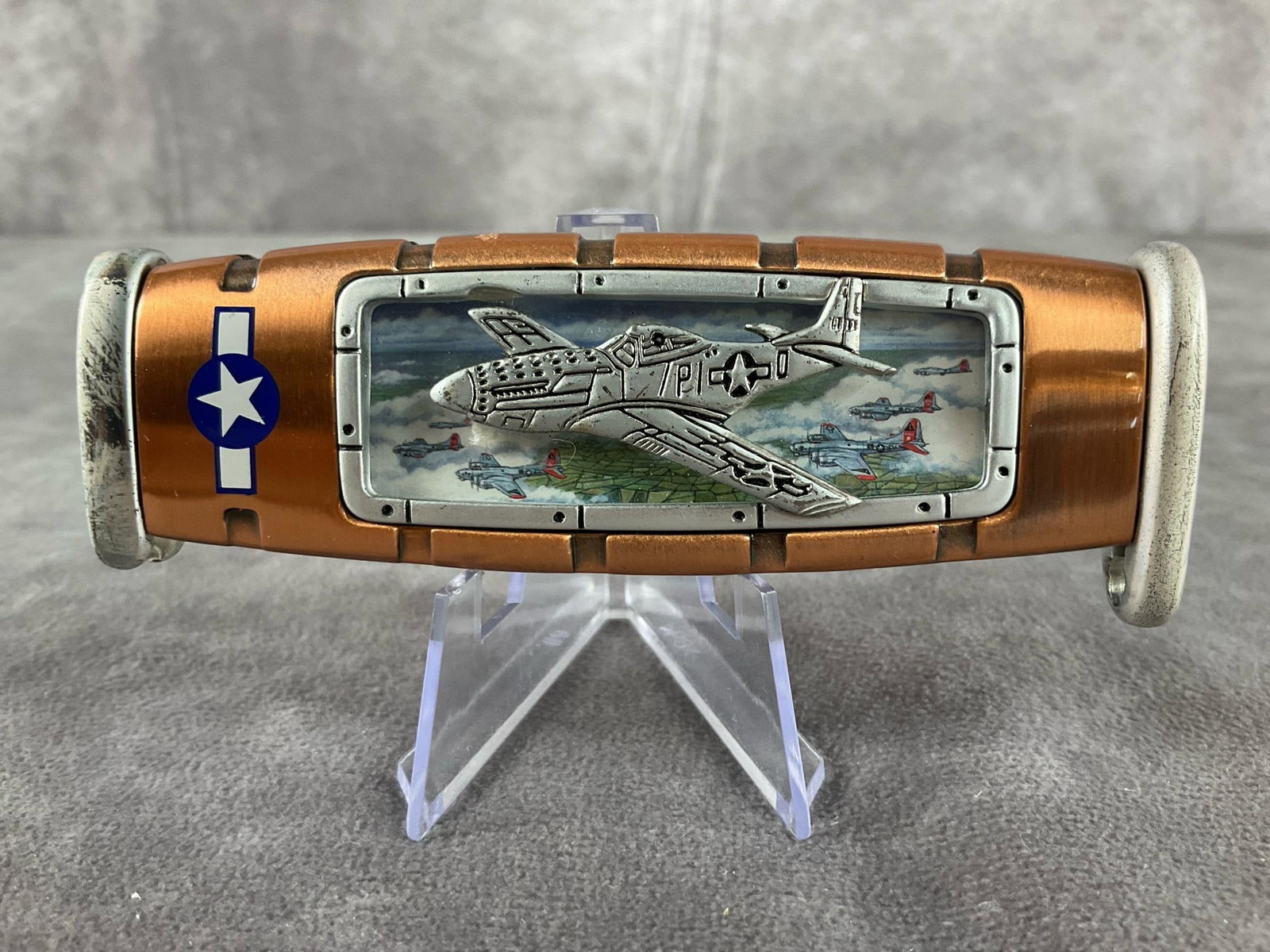 P-51D Mustang Knife: Franklin Mint Collector Folding Mint. Tight snap with sheath. Measures 4 inches closed, 7.25 inches open and 1.25 inches tall.