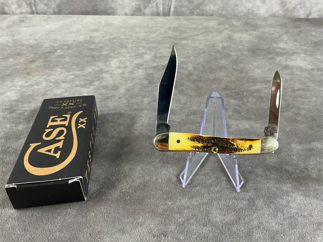 Amber Jigged Bonestag Knife: Case XX Mini Copperhead 6.52109X SS. Tight snap, includes original box. Box measures 4.5 inches wide X 1.75 inches tall.