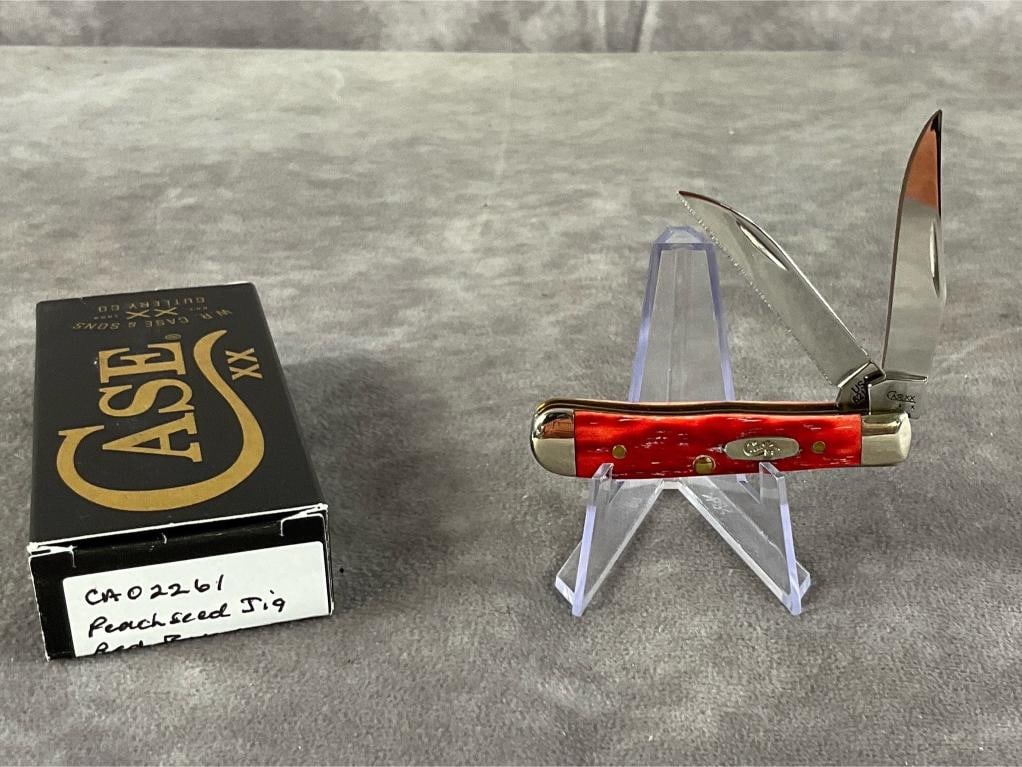 Peach Seed Red Bone Jigged Knife: Case XX Tiny Trapper 62154W SS. Tight snap, includes box, not original. Box measures 4.5 inches wide X 1.75 inches tall.