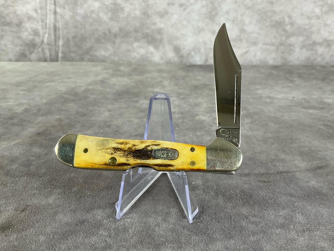 Amber Bone Knife: Case XX Mini Copperlock 61749L SS Tight snap. Measures 3 5/8 inches closed and 6 1/4 inches open.