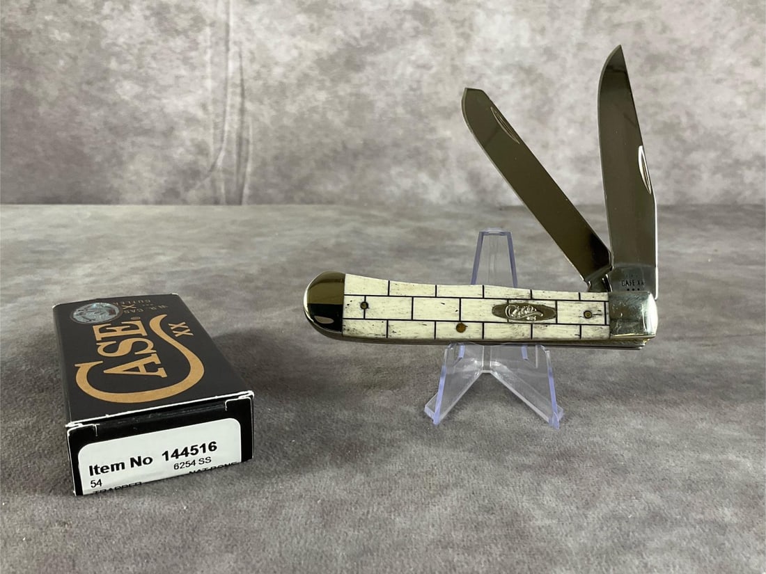 Bricked Natural Bone Knife: Case XX Trapper 6254 SS Tight snap, includes original box. Box measures 4.5 inches wide X 1.75 inches tall.