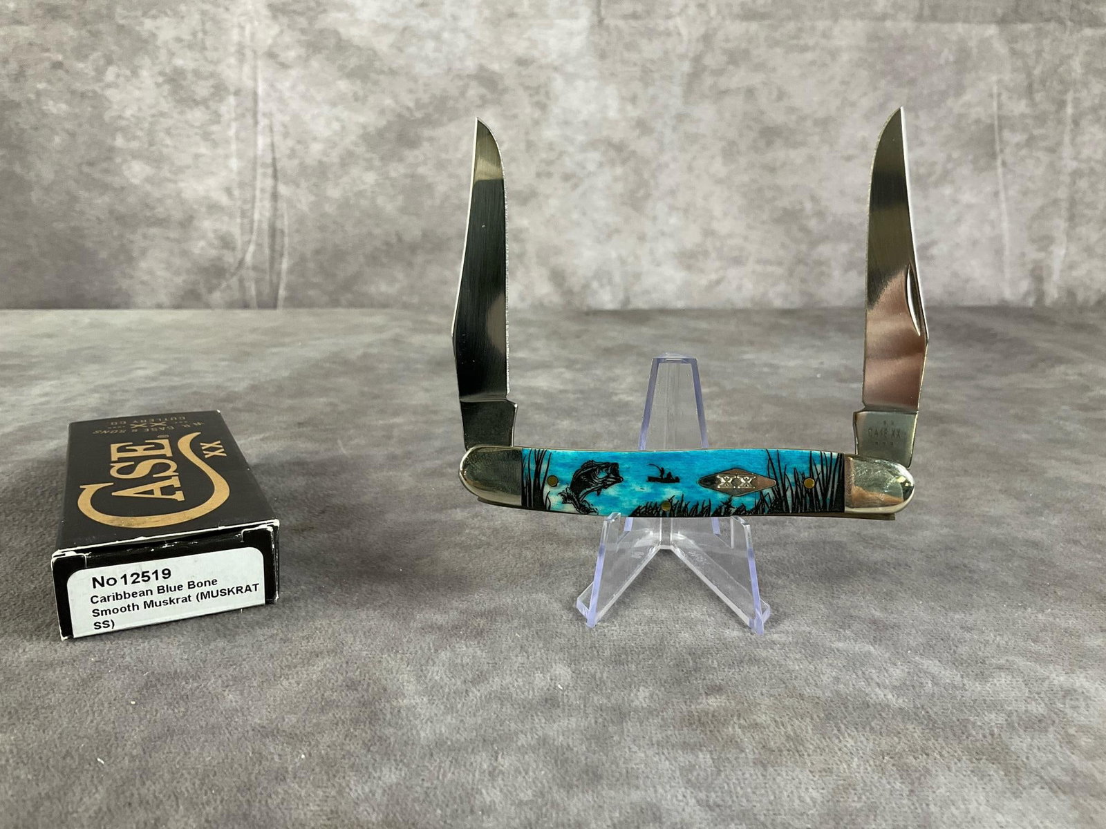 Smooth Caribbean Blue Bone Knife: Case XX Muskrat SS Tight snap, includes original box. Box measures 4.5 inches wide X 1.75 inches