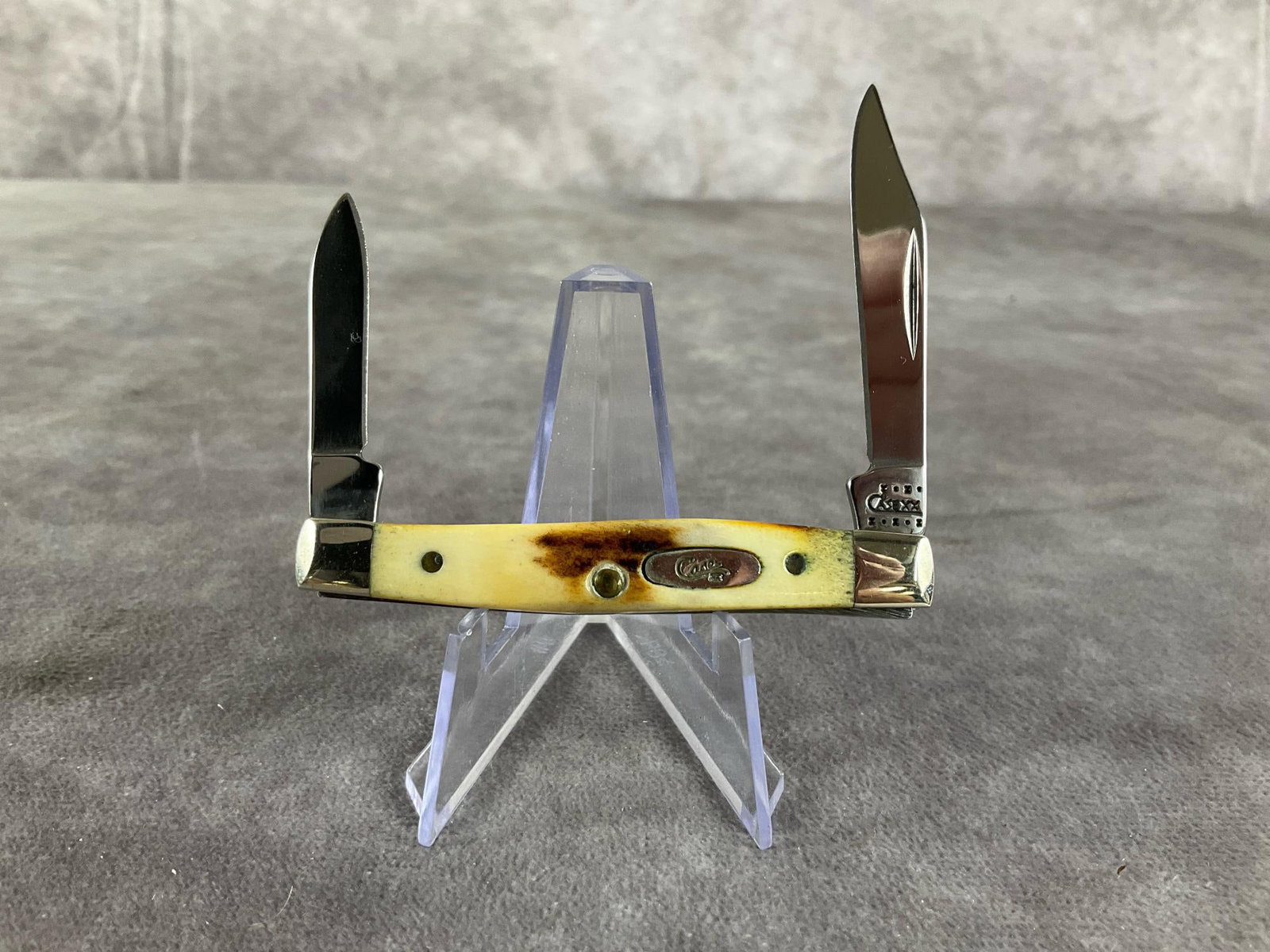 Genuine Sambar Stag Knife: Case XX Traditional Small Pen 5233 SS Tight snap. Measures 2 5/8 inches closed and 4.5 inches open.