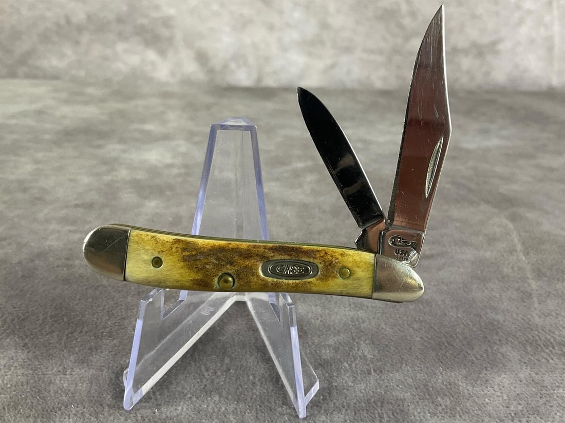 Genuine Sambar Stag Knife: Case XX Peanut. 5220 SS Tight snap. Measures 2 7/8 inches closed and 4 7/8 inches open.
