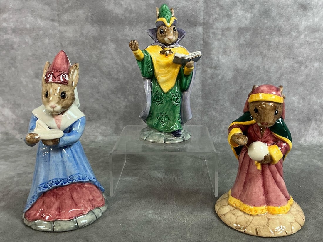 Bunnykins Collectible Figurines: Three 1999 - 2000 Royal Doulton porcelain figurines. All hand painted and numbered. Set includes Mystic Bunnykins, Sundial Bunnykins, and Fortune Teller Bunnykins. All in good condition. Sundial