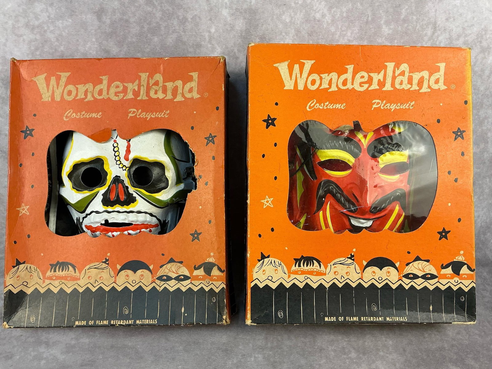 Halloween Costumes: Two 1950's - 1960's Wonderland Halloween Playsuit costumes. Made by the Bland Charnas Company, Inc. Stamford, Conn. Devil costume is a size medium and includes a mask and cape. Skeleton costume is a