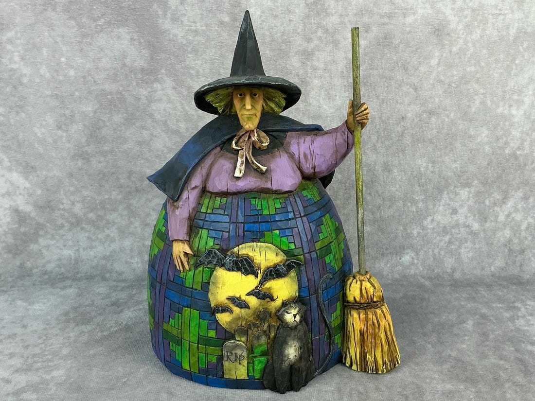 Halloween Witch Jim Shore: 2004 Jim Shore Heartwood Creek "Let the Magic Begin" figurine. Licensed by Enesco Group, Inc. Item / SKU number 117678. In good condition. Measurements are 6.75 inches diameter x 9 inches tall.