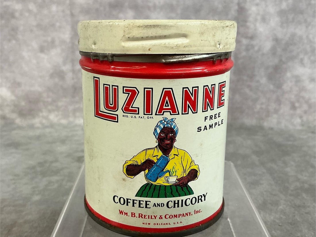 Luzianne Coffee Sample Tin: 1920's Free Sample tin of Luzianne Coffee and Chicory. Screw top tin made by WM B Reily and Co. Age related wear, otherwise in good condition. Measures 2.5 inches in diameter x 3.25 inches tall.