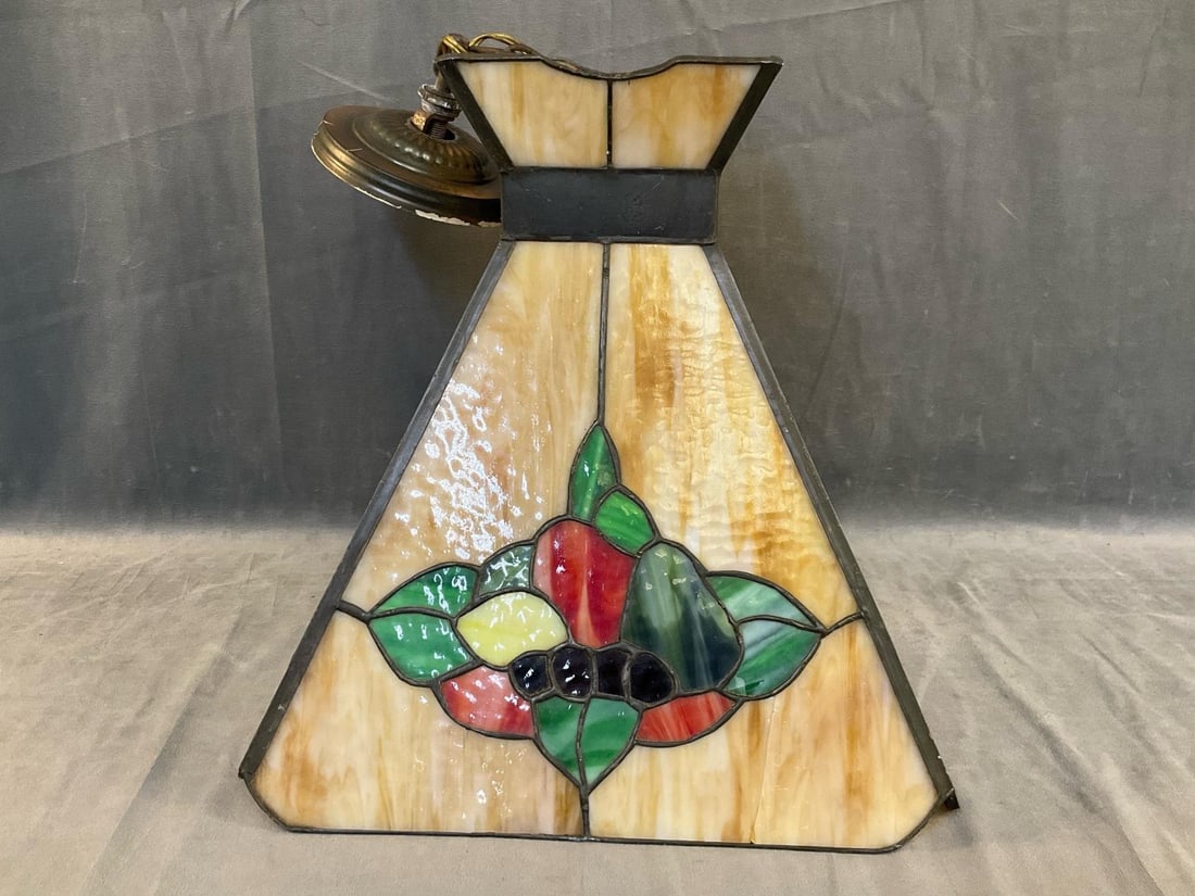 Leaded Glass Lamp: Circa 1960's - 1970's leaded glass hanging lamp. Broken interior globe, otherwise good condition. Not tested. Measures 14.75 inches wide x 14.75 x 15.25 inches tall.
