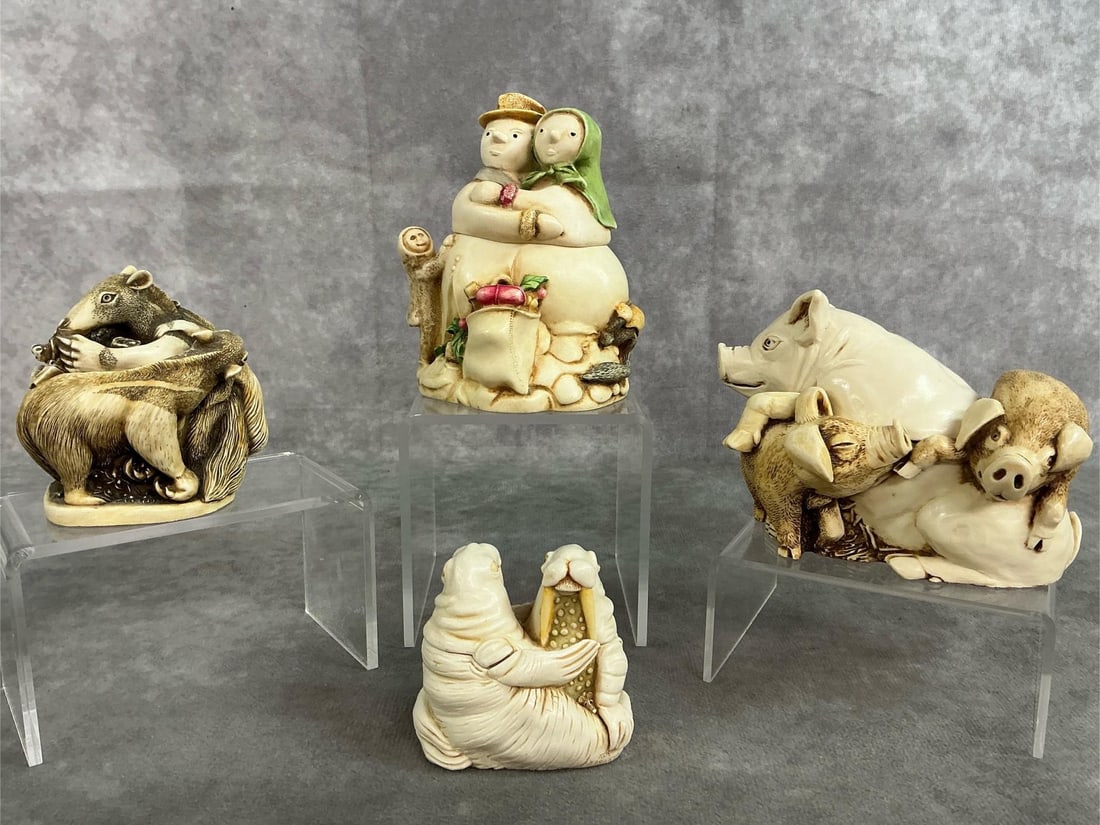 Harmony Kingdom Box Figurines: Four 1991-1999 Harmony Kingdom collectibles. Set includes "Snowdonia Fields" Snowmen, "Antipasto" Anteaters, "Pen Pals" Pigs and "Love Seat" Walruses. Each figurine has the Harmony Kingdom label