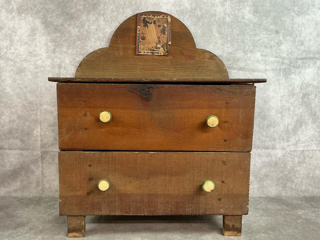 Homemade Small Chest of Drawers: Early 1900's homemade wooden two drawer chest. Drawers are made from fruit crates. Proabably used for play or for accessories. Age related scuffs and discoloration. Measures 16 inches wide x 10.5 x