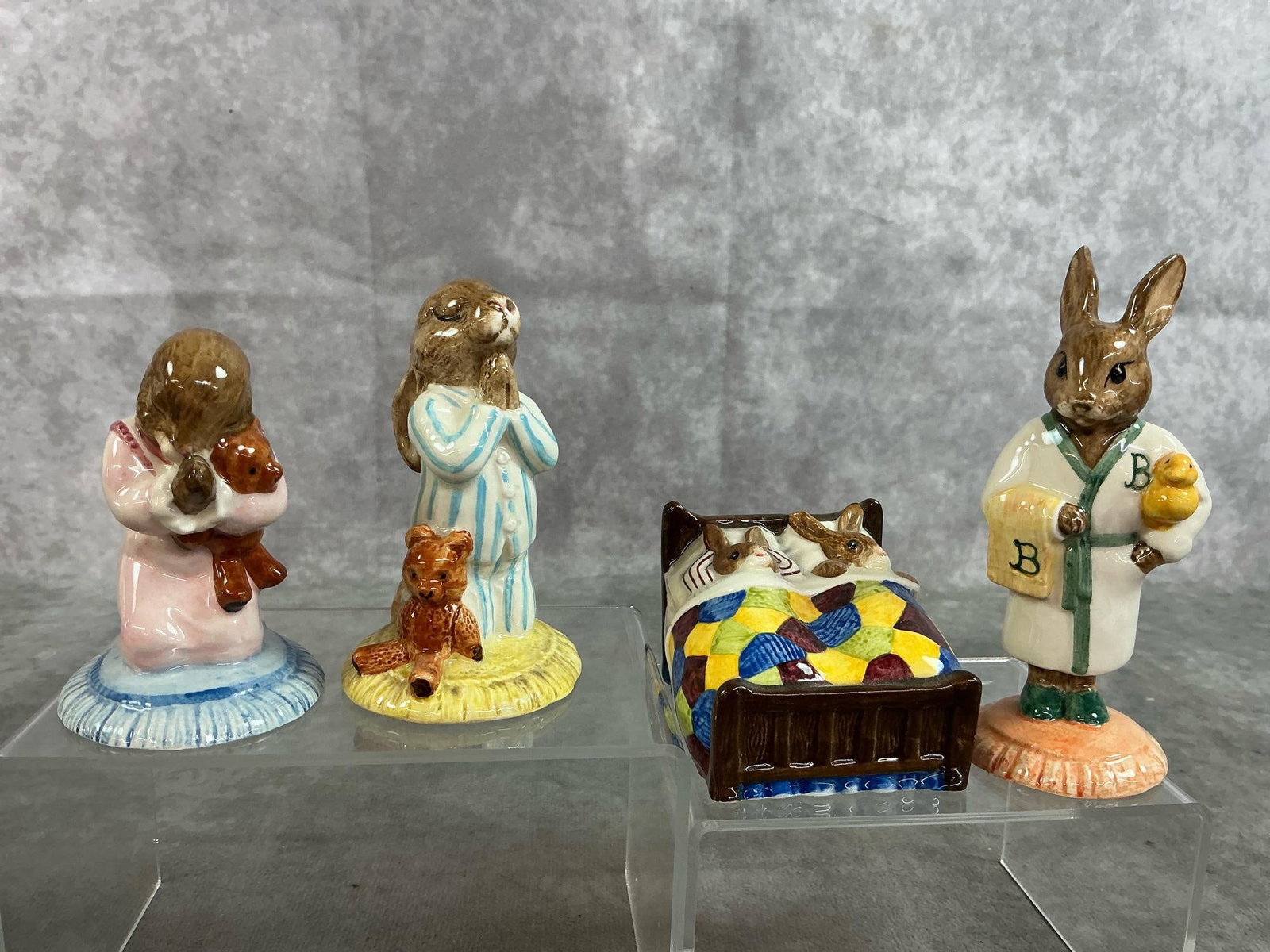 Bedtime Bunnykins: Four 1975-1996 Royal Doulton Bunnykins figures. Includes Goodnight, Bathtime, Sleepytime, and Bedtime figures. In good condition. Bathtime bunny measures 1.75 inches wide x 4 inches tall.