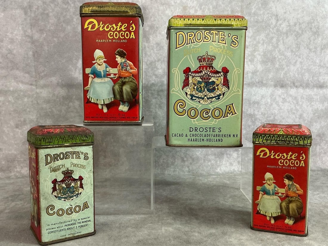 Droste's Cocoa Tins: Four early 1900's Droste's Dutch Process Cocoa tins. Ornate tins with lids from Haarlem, Holland. Some rust, otherwise in good condition. Largest measures 3.25 inches wide x 3.25 x 5.5 inches tall.