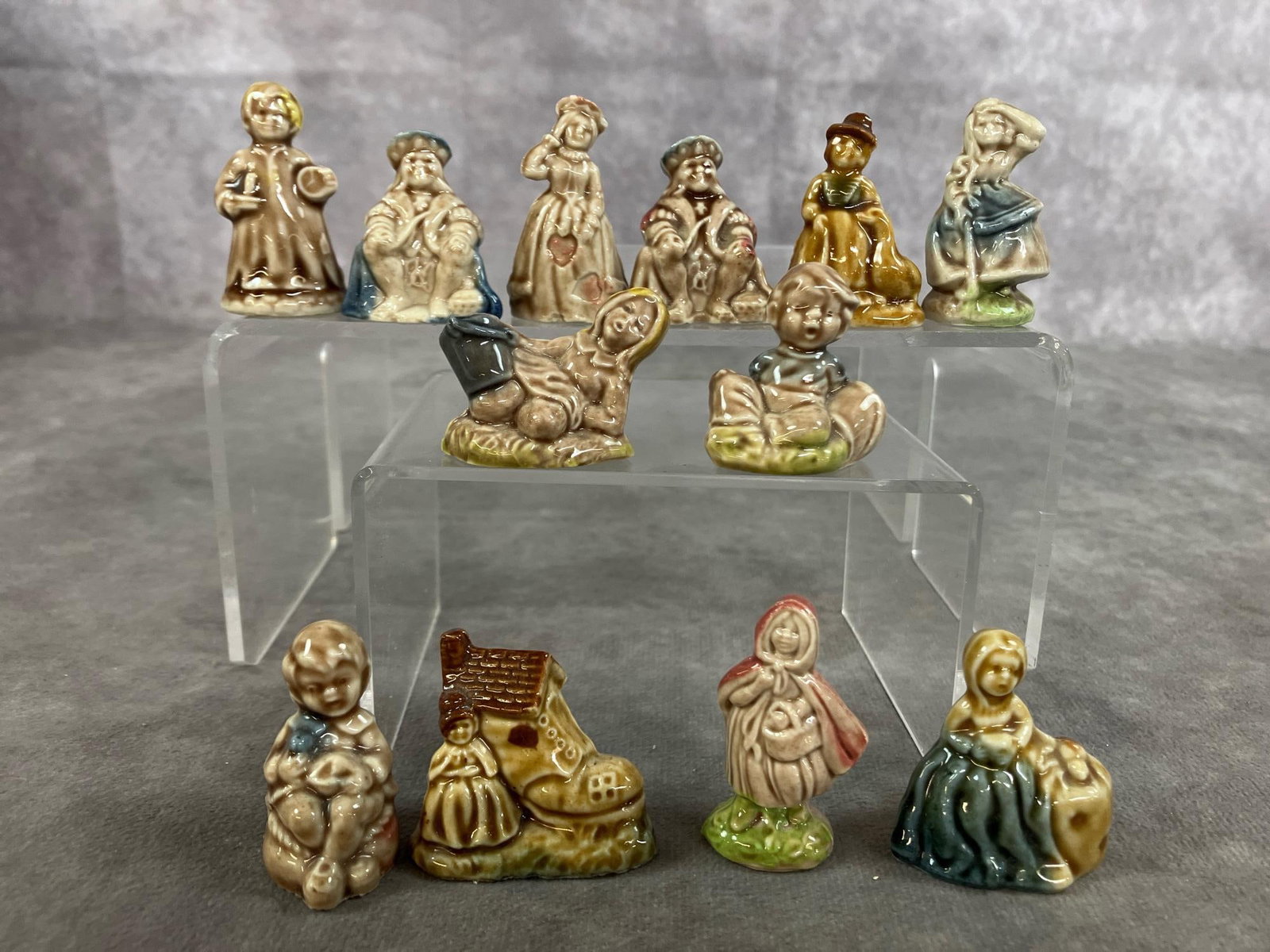 Fairy Tales Miniatures: Twelve mid 1900's Whimsies miniatures. Porcelain "fairy tale" figures from Red Rose Tea. In good condition. Shoe measures 1.5 inches wide x 1 x 1.5 inches tall.