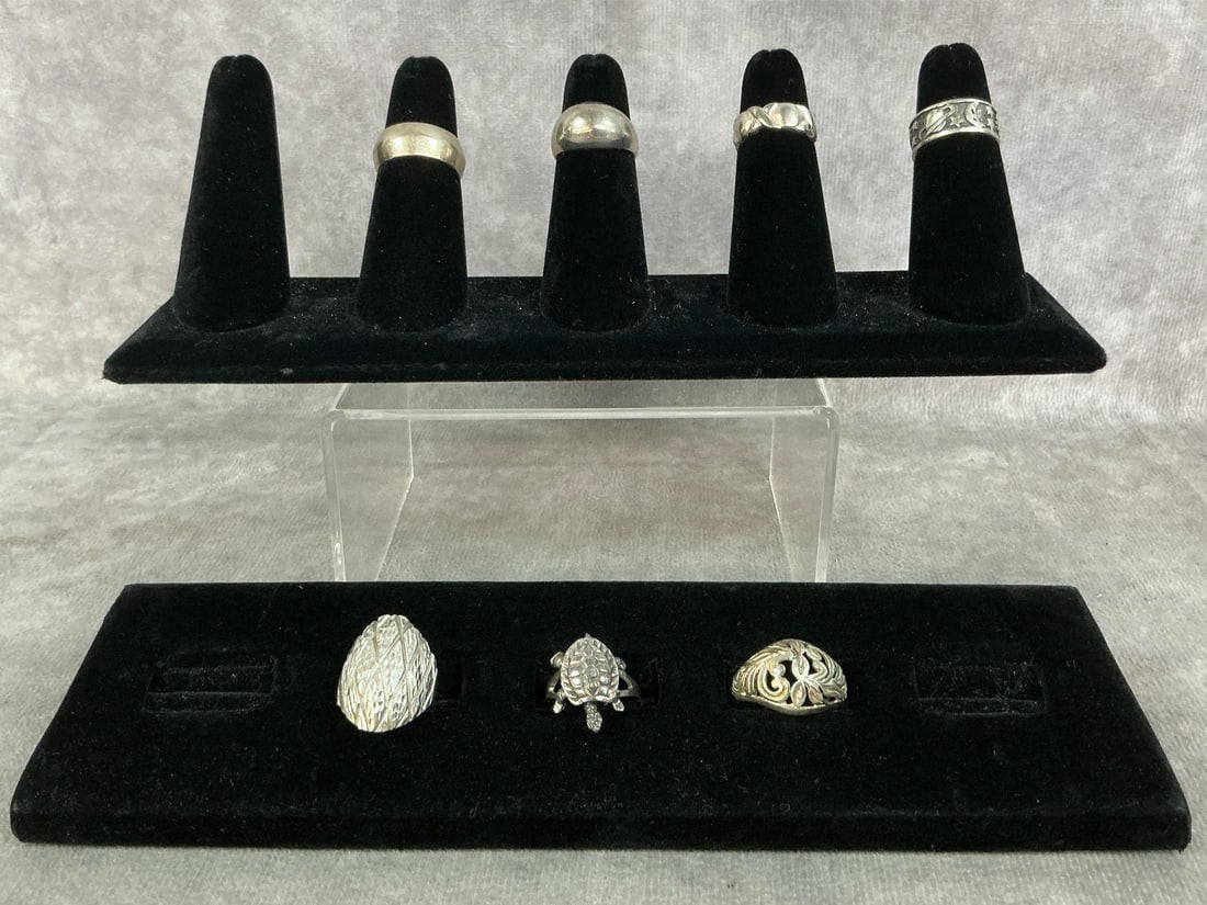 Sterling Silver Rings: Seven sterling silver rings with a variety of styles. All stamped 925. All in good condition. Total weight 1.02 ozt.