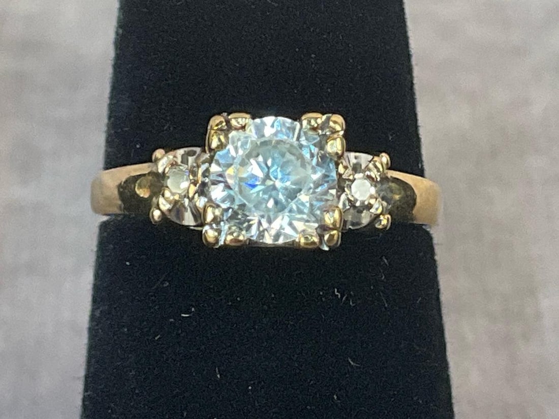 10 kt Gold Diamond Ring: Vintage 10 kt gold ring. Gold stamped 10kt and diamond tested. Total carat .7 ct. Band is split due to wear but otherwise In good condition. Women's size six. Total weight 1.7 dwt.
