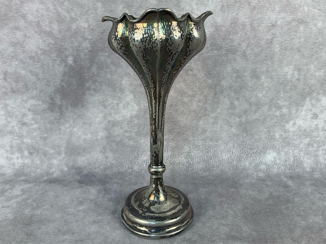 Silver Bud Vase: Antique 1908 weighted sterling silver flower shaped bud vase. Hallmark's on the side of the vase show the lion Passat for Sterling silver and the anchor essay mark for Birmingham. Bottom plate is
