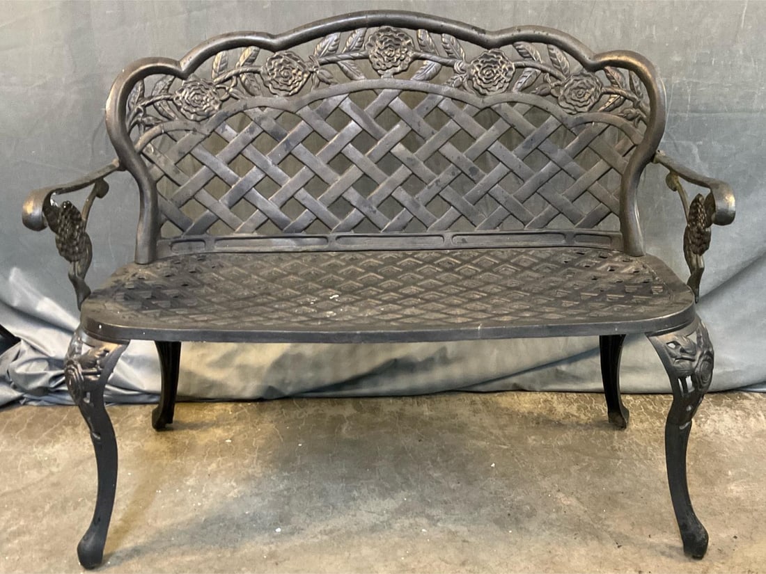 Garden Bench: Modern cast iron black painted garden bench with cabriole legs. Good condition. Measures 42 inches wide x 19 x 34.75 inches tall.