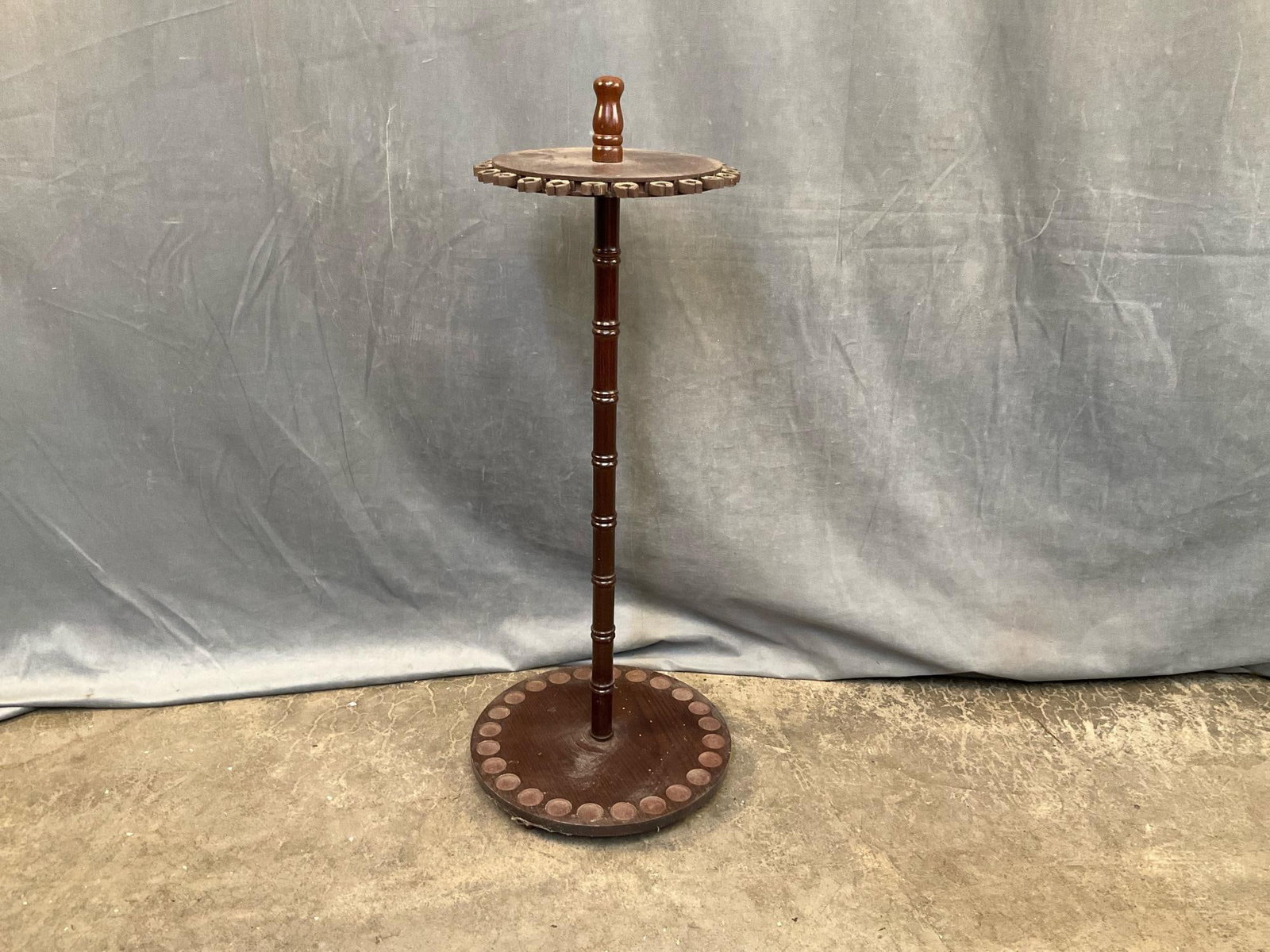 Fishing Rod Stand: Late 20th century fishing rod stand/billiard cue stand. Good condition. Measures 13.75 inches in diameter x 34.5 inches tall.
