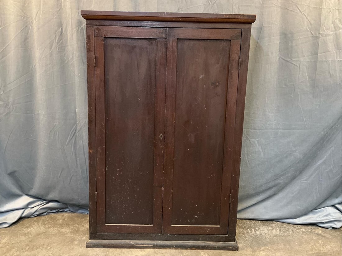 Clerk's Cabinet: Late 19th century clerk's poplar cubby hole cabinet. Missing lower half, otherwise good condition. Measures 35 inches wide x 11.75 x 52.25 inches tall.