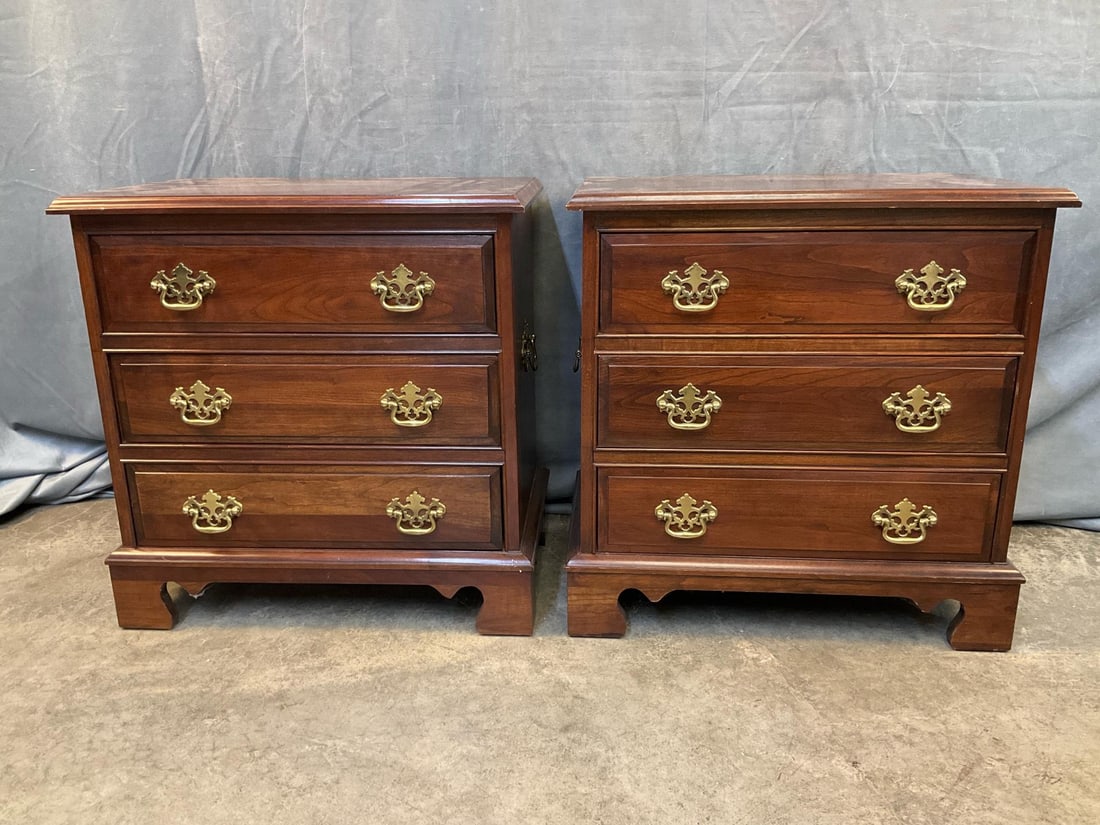 Batchelor Chests: Pair of late 20th century reproduction mahogany Chippendale style three drawer bachelor chests/end tables. Good condition. Measures 22 inches wide x 14 x 22.25.