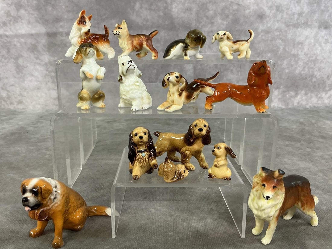 Hagen-Renaker Collectible Dogs: Fourteen late 1900's to early 2000's Hagen-Renaker ceramic dogs. Includes spaniels, terriers, collie, St Bernard, and more. In good condition. Collie measures 3 inches long x .75 x 2 inches tall.