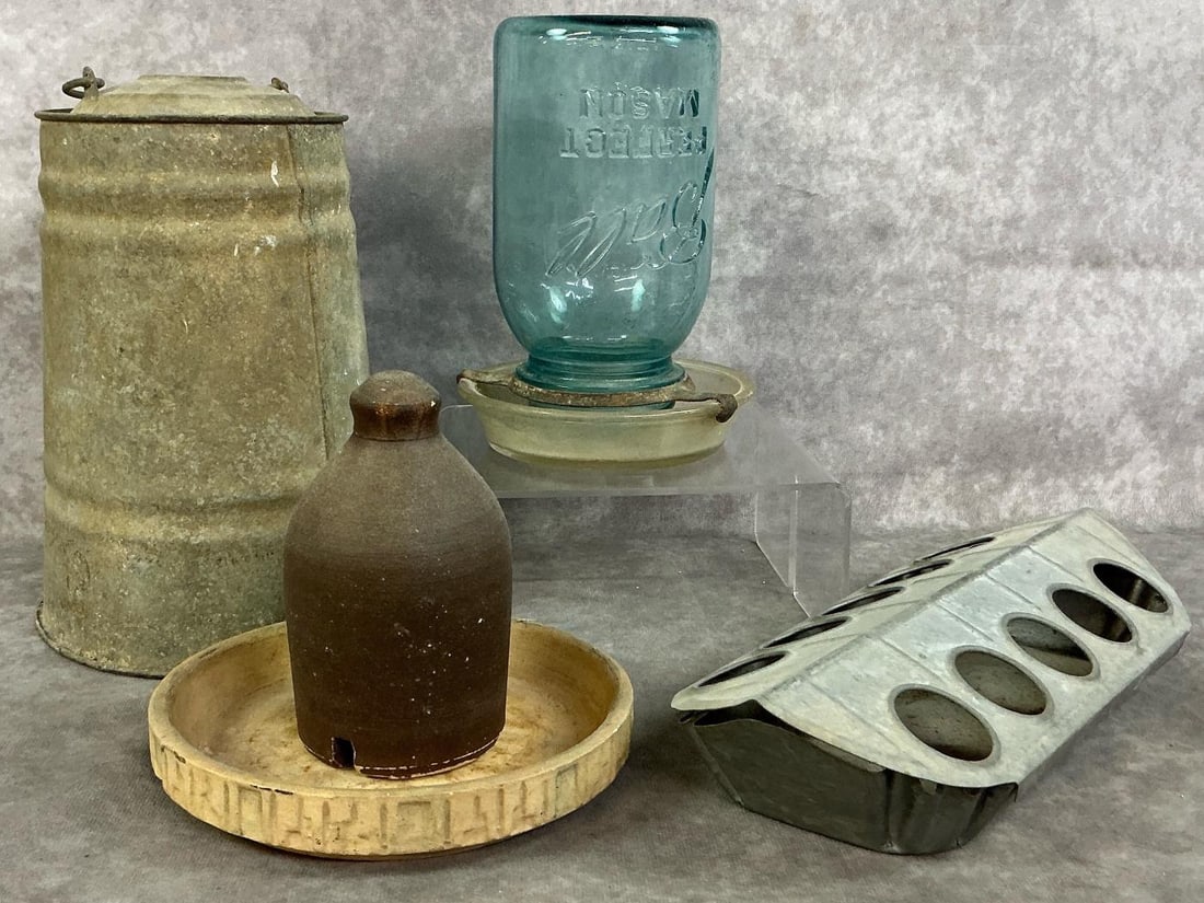 Antique Poultry Feeders & Waterers: Four early 1900's chick and poultry feeder and watering vessels. Mason jar with glass base for watering, and brown stoneware mini jug with open base for watering in pottery base. Includes galvanized c
