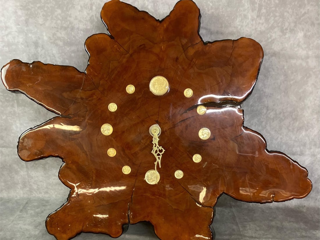 Wood Slab Wall Clock: Late 1900's Handcrafted wooden slab clock featuring vintage coins for hour marks. High gloss lacquered finish. Twelve o'clock mark is Morgan silver dollar 1885, other coins are from 1960's. Clock