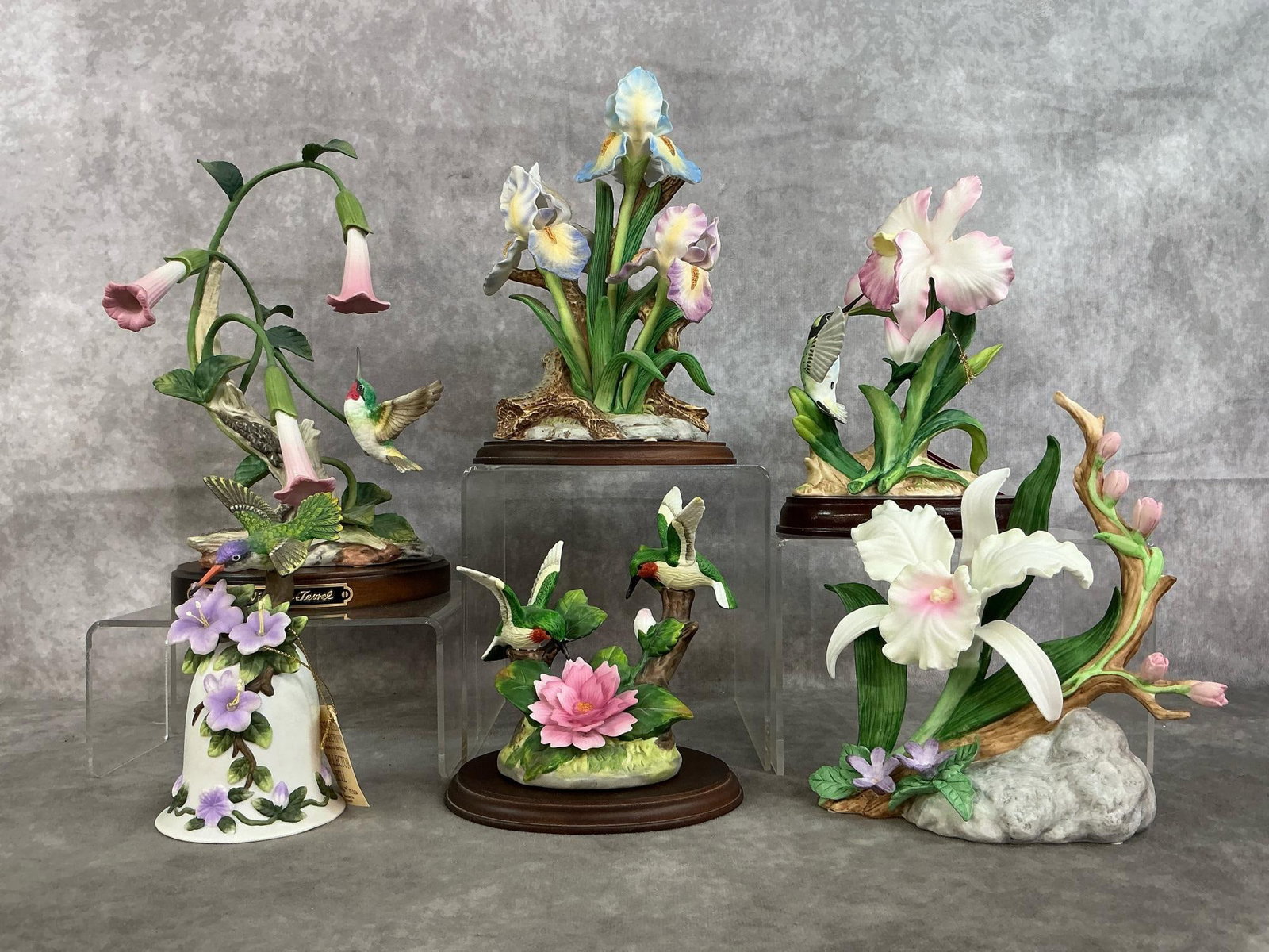 Bone China Hummingbirds & Flowers: Five late 1900's Home Interior floral bone China and a Seymour Mann bell. Homeco handpainted irises and datura with hummingbirds. Fine bisque collectors "Bernini" design bell. In good condition.