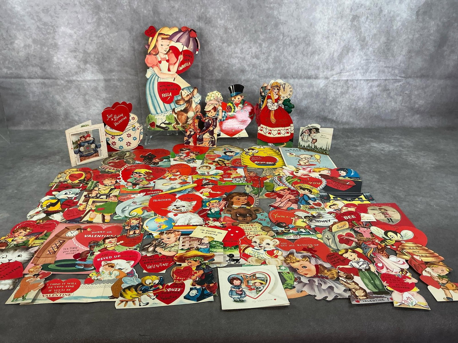 Valentines for Children: Over fifty Valentines from 1920's- 1960's. Includes Valentine Fairy Tale booklet, and cards that expand and have moving parts. Most have been written on back. In good condition. Largest measures 5