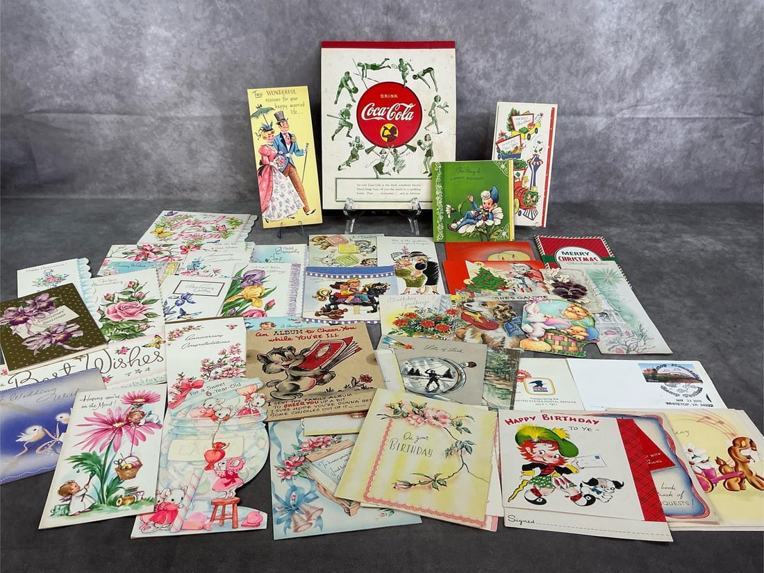 Vintage Greeting Cards & Notebook: Forty-five 1930-1950's greeting cards and Coca-Cola notepad. Cards include holiday, birthday, anniversary, get well, and more. Lined and bound note book with Coca Cola ad on cover. Most cards are