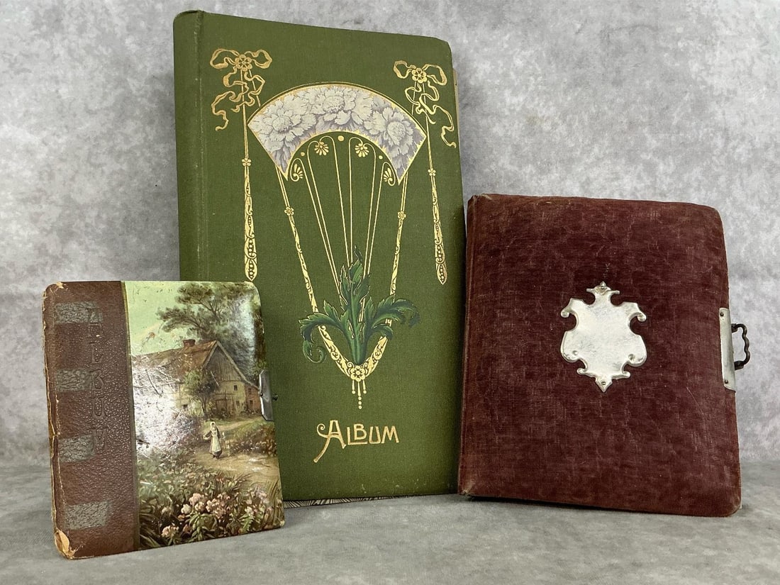 Antique Photo Albums: Three late 1800's to early 1900's photo albums. Pictures included in two smaller albums. Age and wear present with fair to poor conditions. Green album measures 8 inches wide x 2 x 14 inches tall.