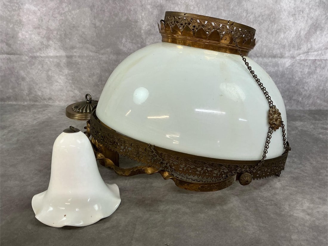Victorian Hanging Lamp: Late 1800's hanging parlor oil lamp. Pulley style counter weight with white glass dome and brass edging and hardware. Some tarnish, otherwise in good condition. Measures 14.5/inches in diameter x 11