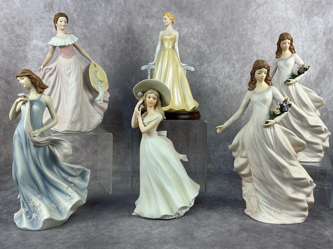 Women Figurines: Six 1996-2004 HomeInteriors collectible figurines. Lot includes "Grace Patricia", "Melanie", two "Daphne's", "Grace" and "Stephanie". One Daphne has a chipped hand and the other Daphne has a missing