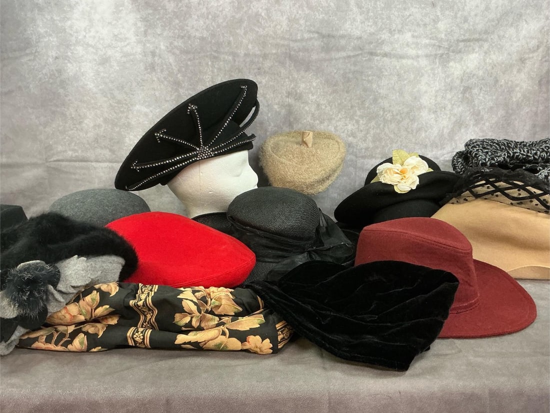 Vintage Hats: Fourteen mid to late 1900's ladies hats. Varied styles, textures, colors and accents. Fabric purse with wooden handles included. In good condition. Black hat with sequins measures 14 inches in