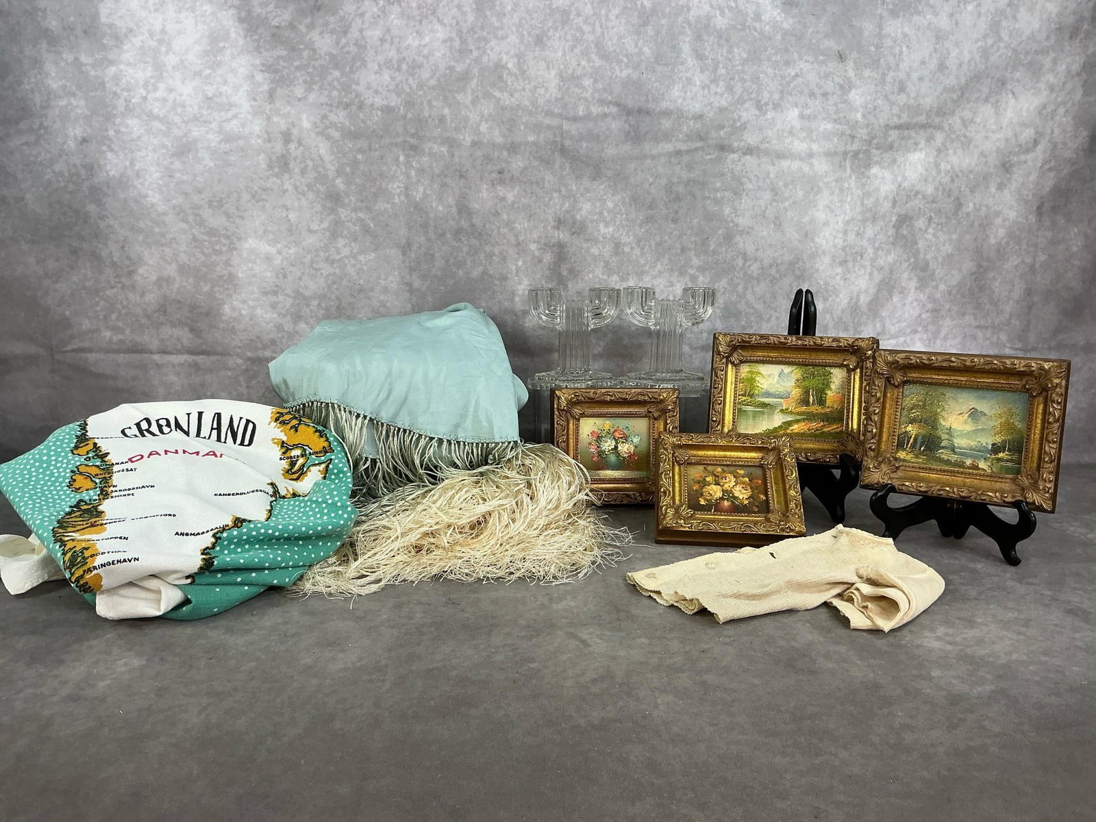 Vintage Miniature Pictures, Shawl, Candle Holders, & More: Nine mid 1900's collectible items. Marimekko fabric tablecloth with map of Greenland, mint green and cream colored silk shawl with long fringe, and two Anchor Hocking Queen Mary glass double arm
