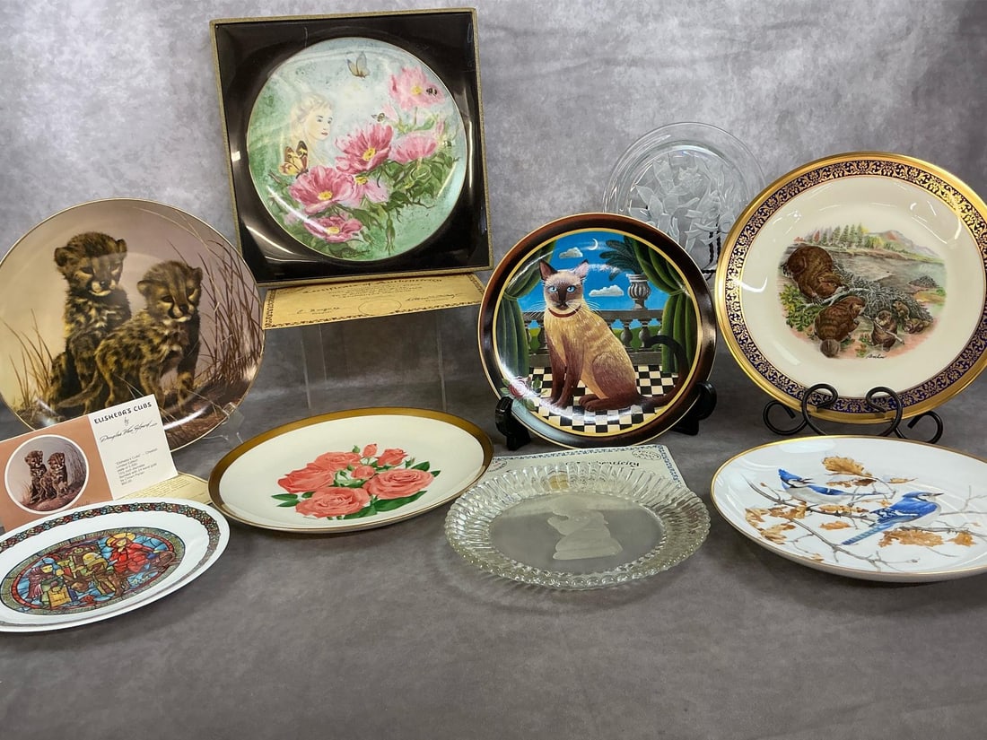 Special Edition Plates: Nine late 1900's to modern age collectible plates. D'Arceaul, Limoges plate featuring Joseph, Mary and infant Jesus. Kaiser "Blue Jays" #303, Elisheba's Cubs by Crown Parian, Uncle Tad's Cats #3399,