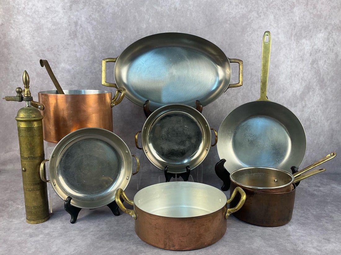 Copper Pots & Pans: Ten vintage kitchen cookware items. Includes four saucepans, a ladle, a frying pan, an oval au gratin pan and a brass turkish coffee mill grinder. Normal wear from use otherwise all in good