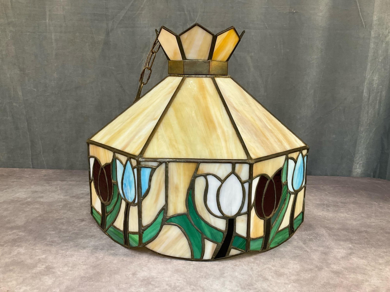 Stained Glass Lamp: 1960's-1970's Tiffany/Art Nouveau Style leaded stain glass floral design hanging pendant lamp. Not tested. Good condition. Measures approximately 17 inches wide x 17 x 15.25 inches tall.