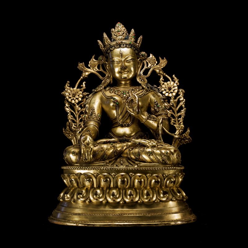 Chinese Tibetan Buddha: Qing dynasty Size: the Buddha overall 25.0 cm high 17.0 cm wide base base 13.8 cm thick This statue of tara faces such as the young woman, wearing a five Ye Bao crown, decorative colorful, gourd shape