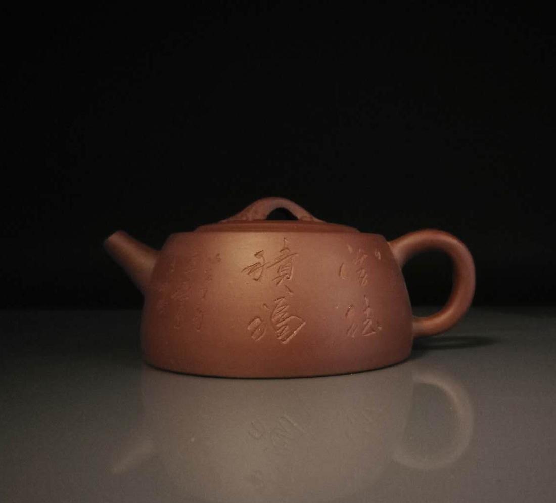 Chinese zisha teapot and cover.(Mark of Zhou xiangrong): Chinese zisha teapot and cover.(Mark of Zhou xiangrong).Size:10*6cm
