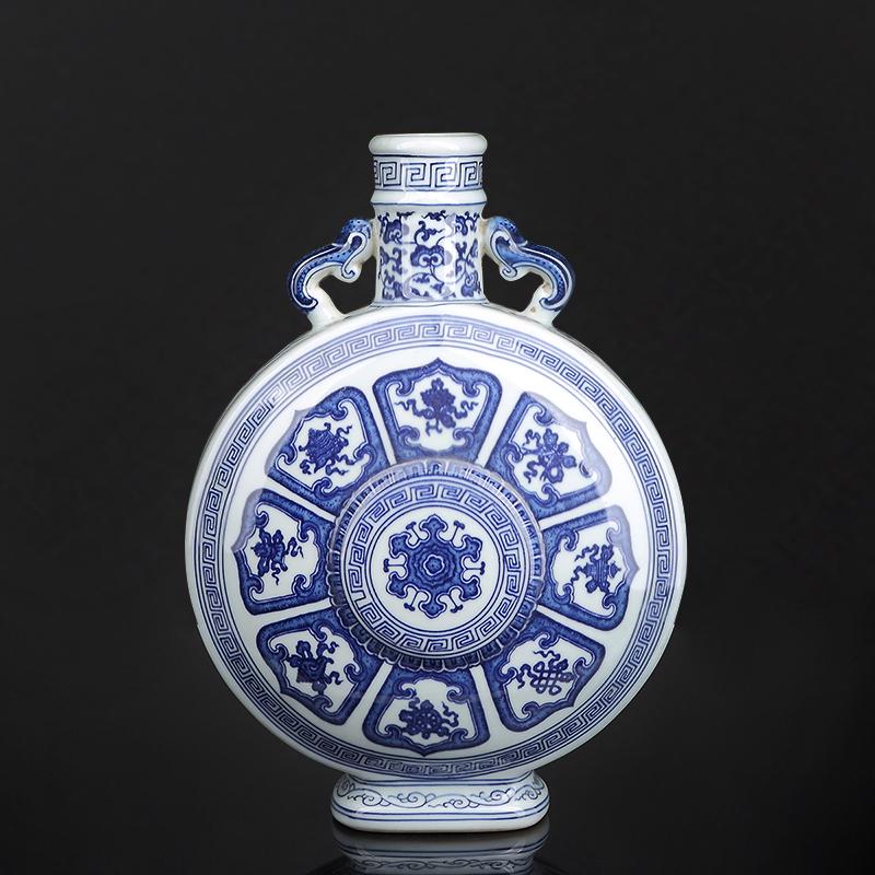 Chinese Blue and White Moon Flask: Chinese Blue and White Moon Flask.China, Qing dynasty, blue and white moon flask, Qianlong mark. Height 13 1/4 in.
