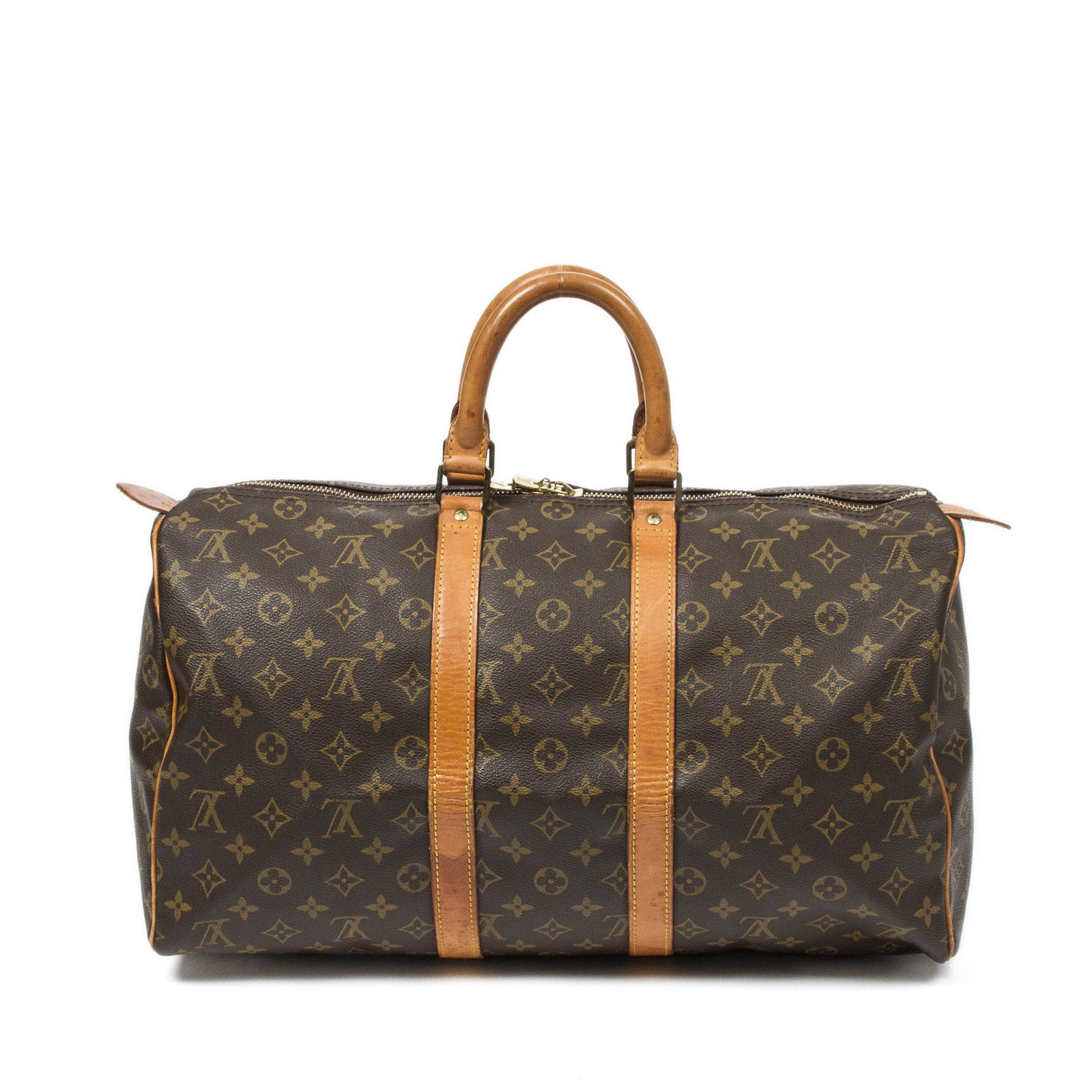 Louis Vuitton Coated Canvas Keepall 45: Pre-loved Louis Vuitton Keepall 45 in Brown Coated Canvas and Golden Brass hardware. Brands Identifier : SP0921. Dimensions: 45*24*20cm. The Item comes with Luggage Tag. All BrandCo Paris items come w
