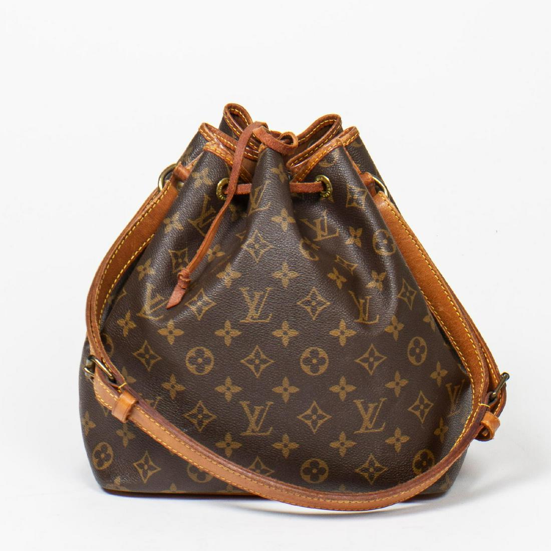 Louis Vuitton Noe PM: Pre-loved Louis Vuitton Noe PM in Brown coated Monogram Canvas with Vachetta leather Strap. The hardware is in Golden Brass. Dimensions (L*H*D in cm): 24*26*18cm. Brand Production Code : 894FC. Some c