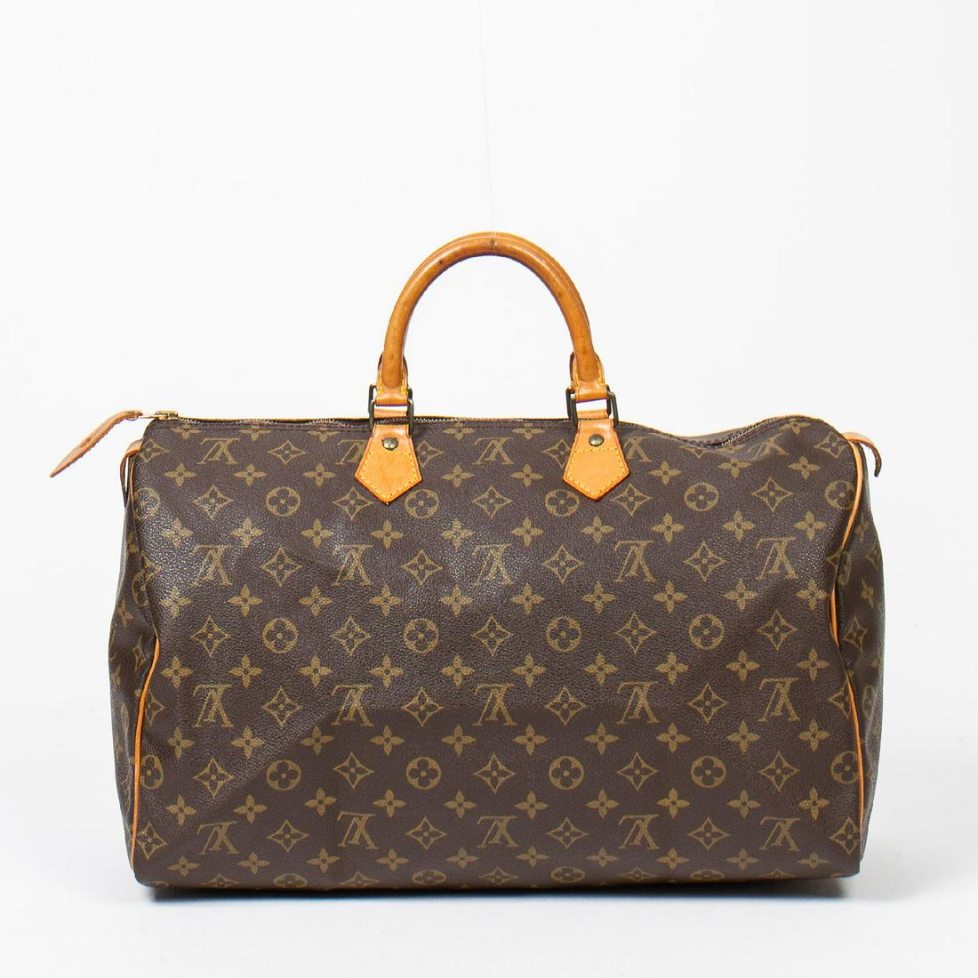 Louis Vuitton Speedy 40: Pre-loved Louis Vuitton Speedy 40 in Brown coated Monogram Canvas with Vachetta leather Handles. The hardware is in Golden Brass. Dimensions (L*H*D in cm): 40*24*19cm. Brand Production Code : MB0931. 
