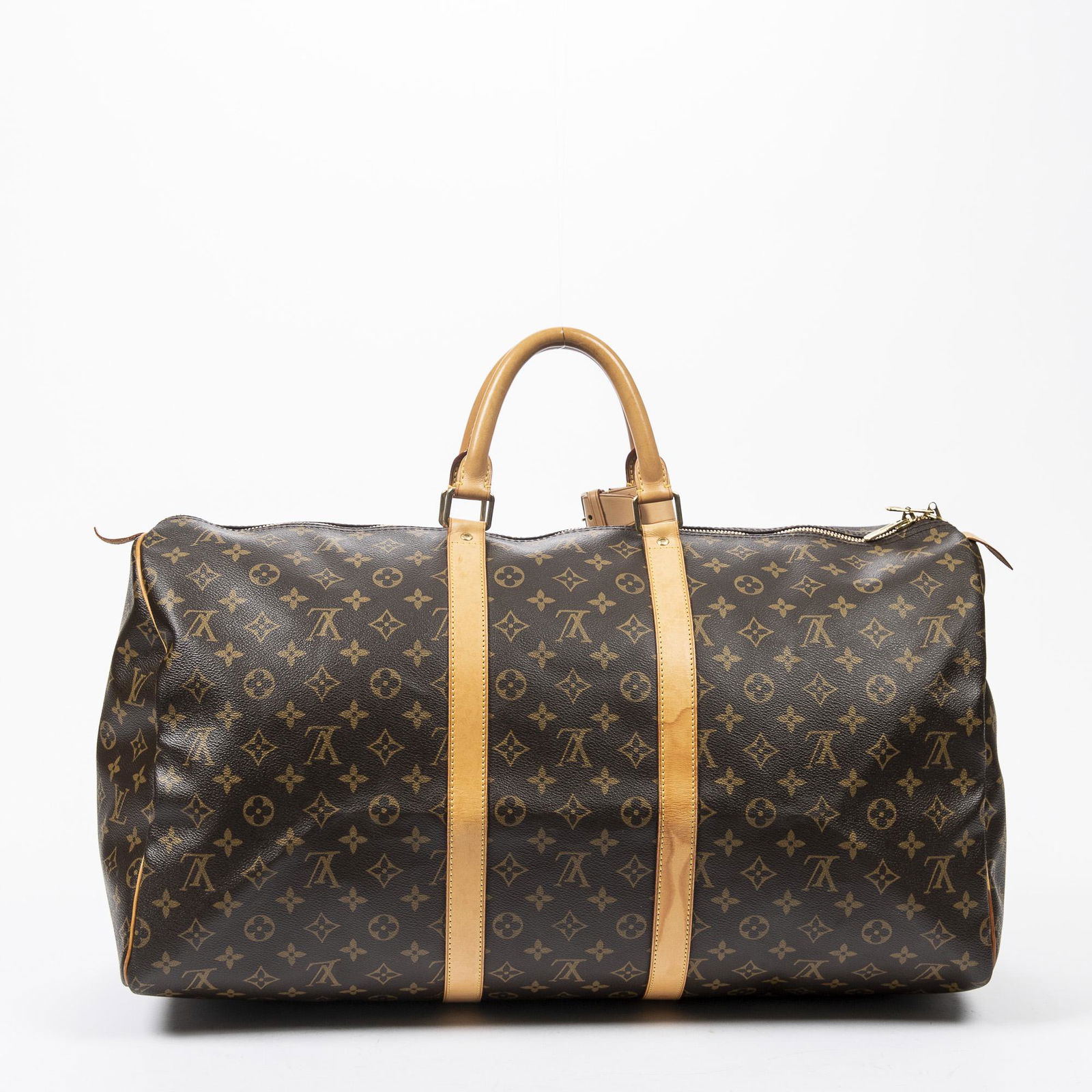 Louis Vuitton Keepall 55: Pre-loved Louis Vuitton Keepall 55 in Brown coated Monogram Canvas with Vachetta leather Handles. The hardware is in Golden Brass. Dimensions (L*H*D in cm): 55*28*25cm. Brand Production Code : MB1016.