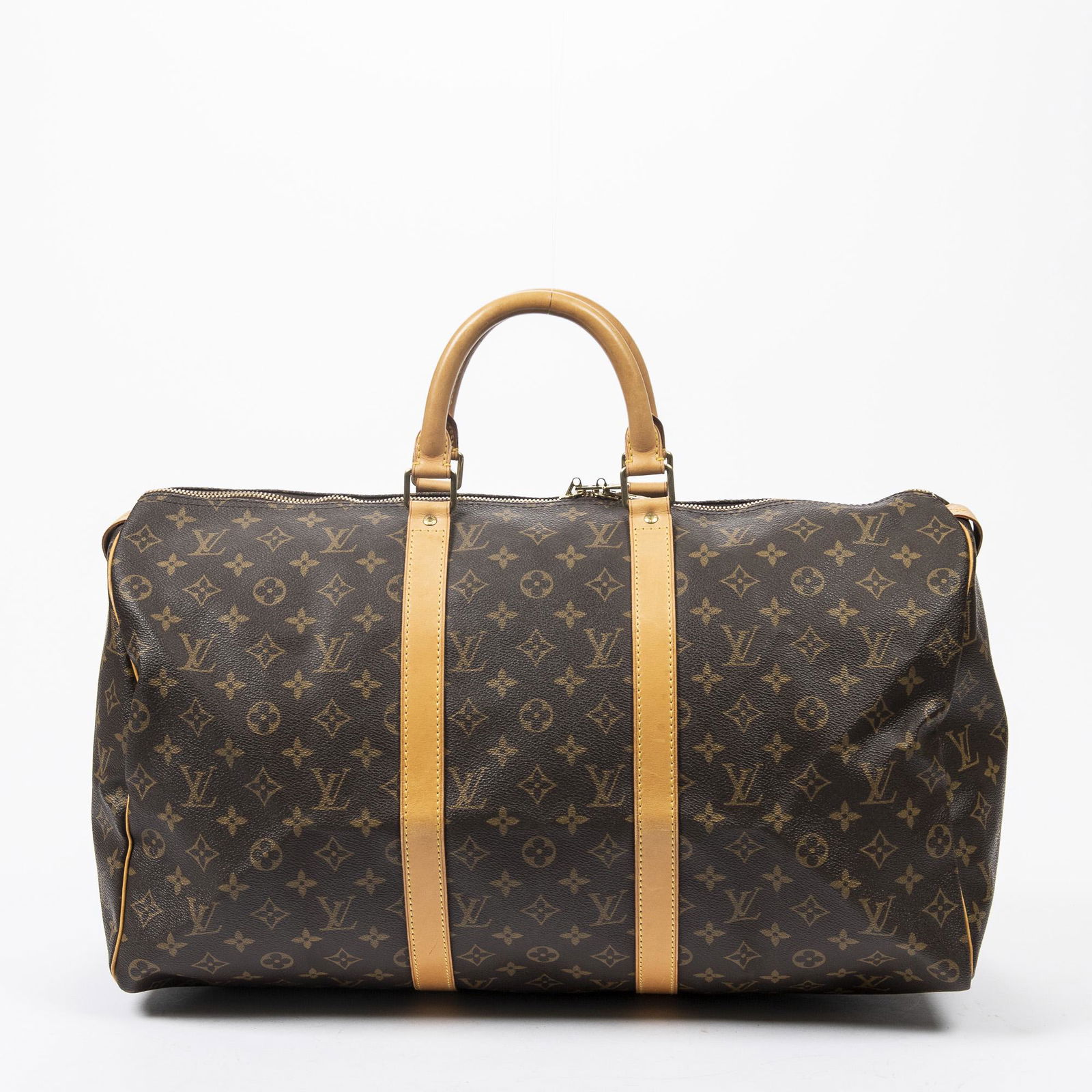 Louis Vuitton Keepall 50: Pre-loved Louis Vuitton Keepall 50 in Brown coated Monogram Canvas with Vachetta leather Handles. The hardware is in Golden Brass. Dimensions (L*H*D in cm): 50*26*22cm. Brand Production Code : SP0918.